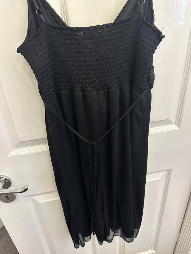 Preview of the first image of Ladies Black Dress size 14 lightweight.