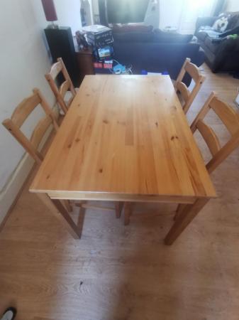 Image 1 of Pine table and four chairs