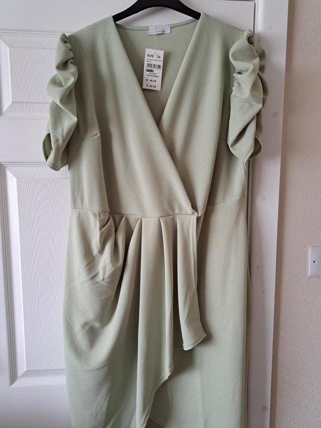Preview of the first image of Sage Green Midi Dress. Size 20.