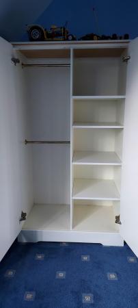 Image 2 of White Nursery Wardrobe with rails and shelves