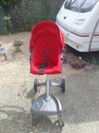 Image 2 of STOKKE push chair in red