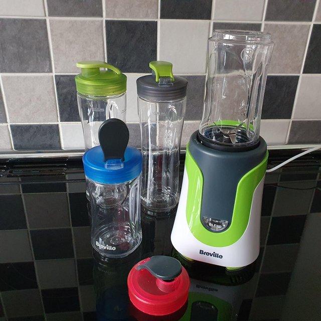 Preview of the first image of Breville family blender colour coded with 4 bottles.