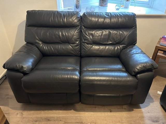 Preview of the first image of 2 seater leather reclining sofa.