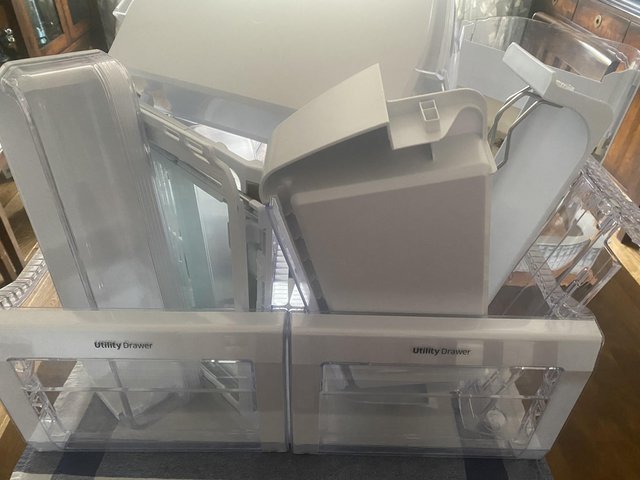 Preview of the first image of Samsung fridge shelves/spares/ice bucket.