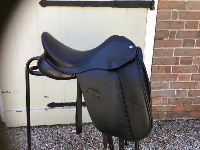 Preview of the first image of Harry Dabbs black leather dressage saddle 171/2 medium wide.