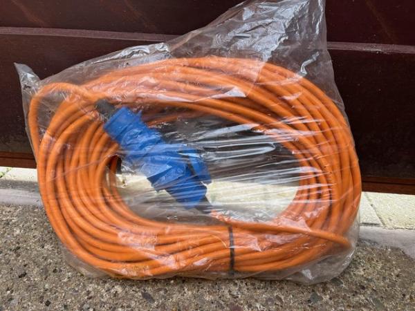 Image 2 of Caravan Hook up cables - one on reel and second in bag