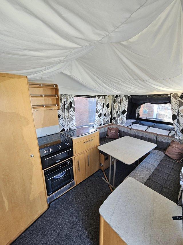 Preview of the first image of 2015 Pennine Pathfinder 6 berth folding camper & 2 awnings.