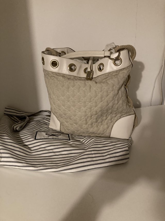 Preview of the first image of Anya Hindmarch designer handbag.