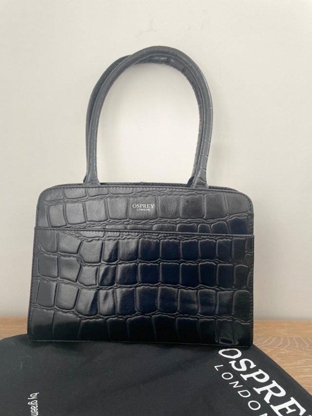 Preview of the first image of OSPREY LONDON Black Leather Handbag.