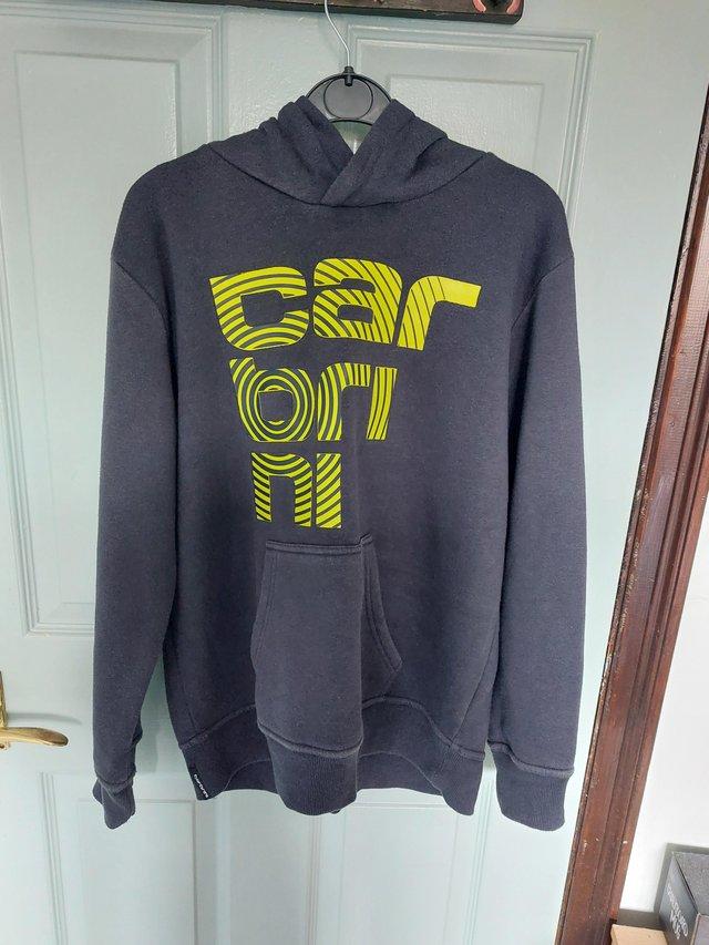 Preview of the first image of Carbrini hoodie aged 13-15 years.