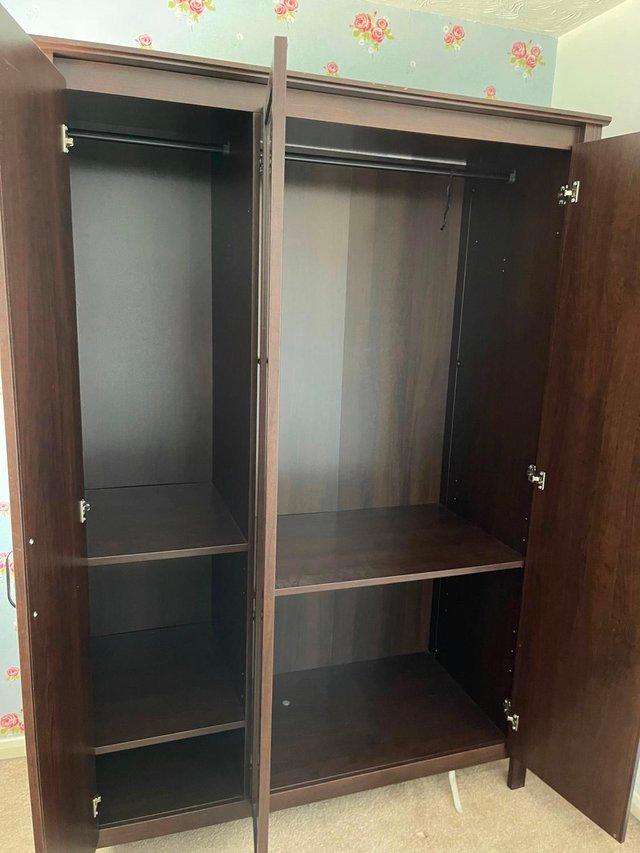 Preview of the first image of IKEA BRUSALI Wardrobe with 3 Doors.