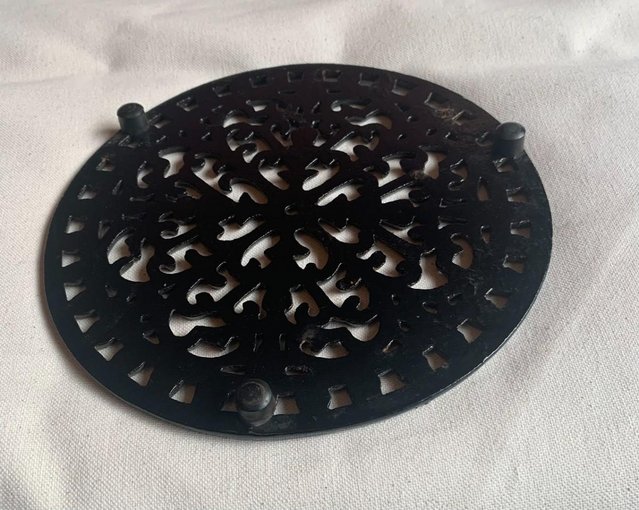 Preview of the first image of Vintage Cast Iron Hot Pan Holder.