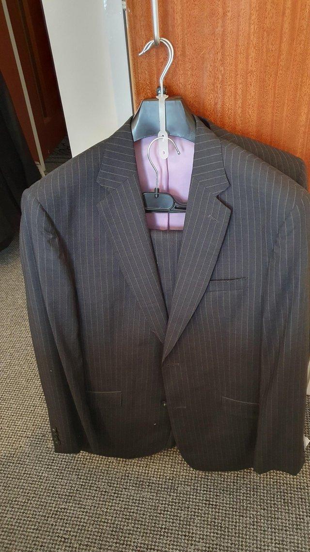 Preview of the first image of GENTLEMAN'S SUITS .. ?? % GENUINE MERINO WOOL.