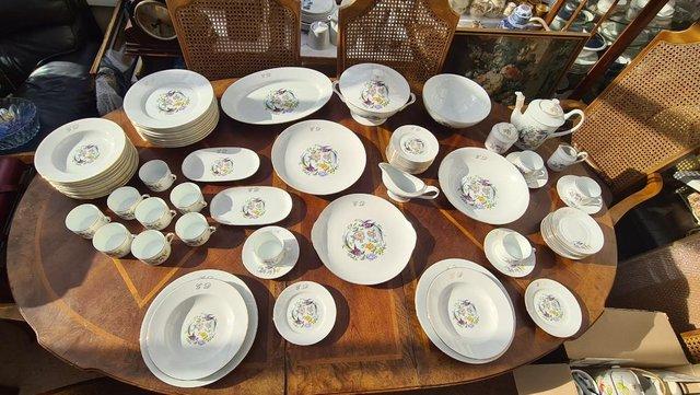 Preview of the first image of Limoges Fine Porcelain Birds of Paradise Dinner Service.