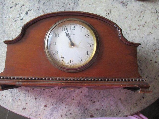 Preview of the first image of Antique French mantle clock in working order.