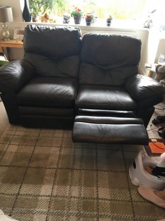 Image 1 of 2 leather sofas they are both recliners but one needs 2 cabl