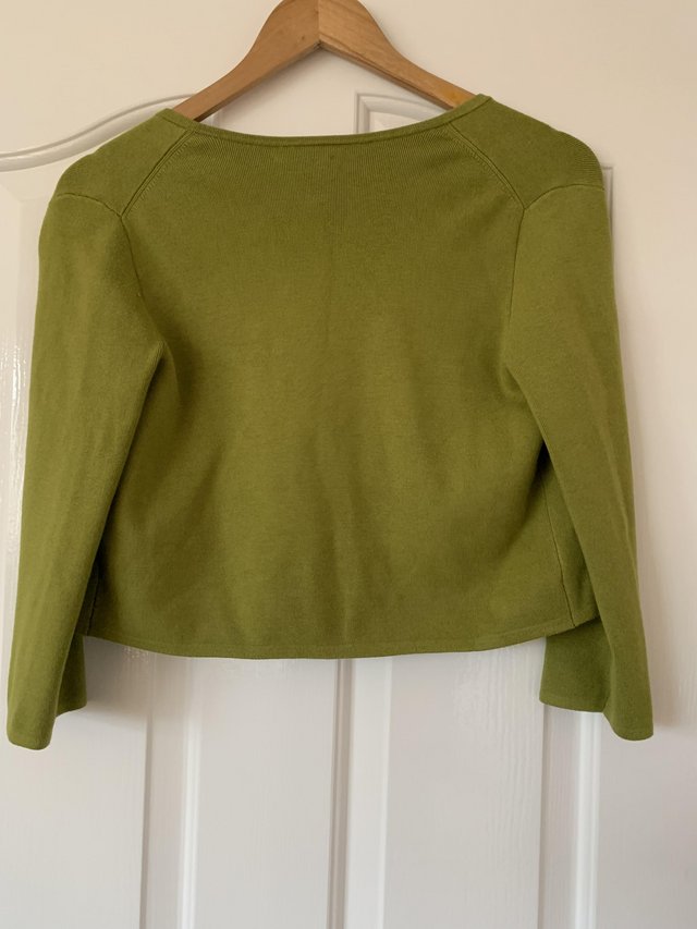 Preview of the first image of Bolero style cardigan olive green. Hobbs. Size xs.
