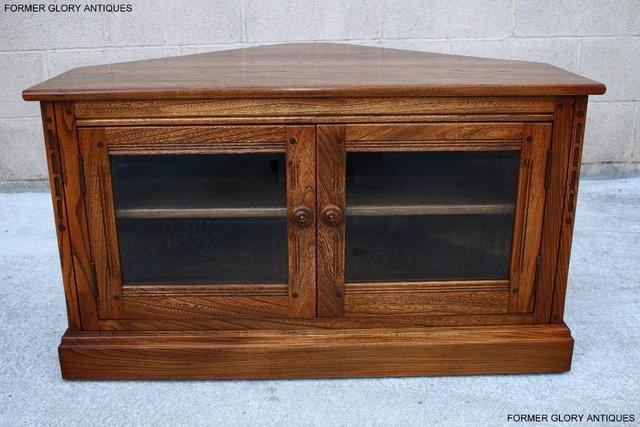 Image 63 of AN ERCOL GOLDEN DAWN ELM CORNER TV CABINET STAND TABLE UNIT