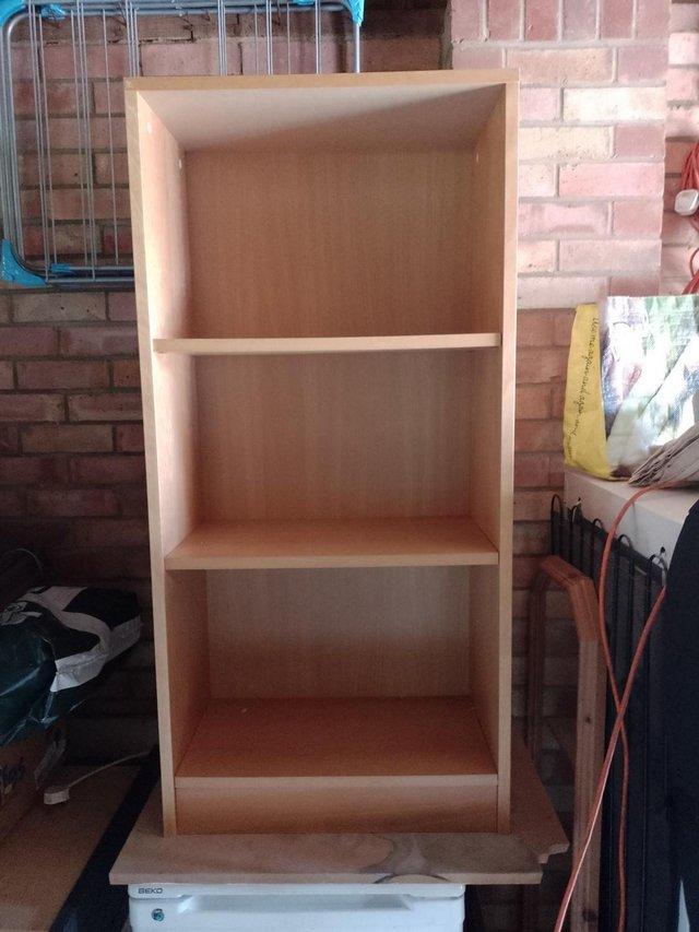 Preview of the first image of Free standing beech wood effect Bookcase.