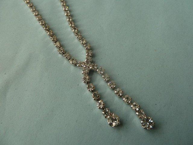 Preview of the first image of Lady's diamante necklace and earring set.