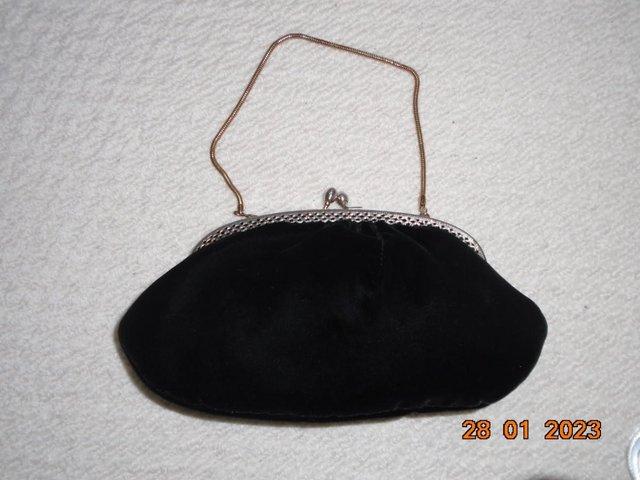 Preview of the first image of Black velvet vintage handbag with "gold" chain strap & clasp.