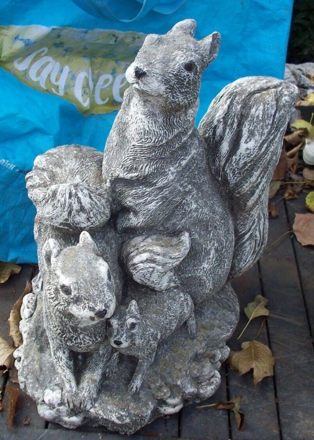 Preview of the first image of Large Squirrel and babies concrete ornament used garden Grey.