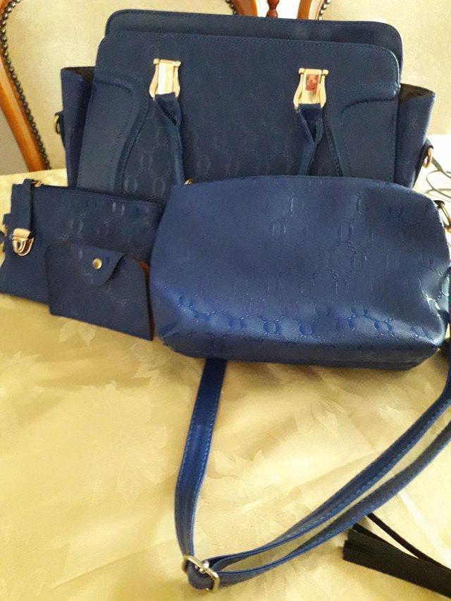Preview of the first image of New Cobalt blue handbag and accessories for sale.