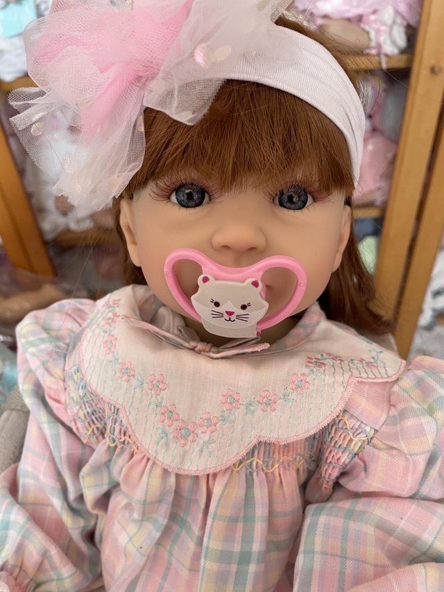 Preview of the first image of Adorable really sweet baby reborn toddler doll girl Amy.