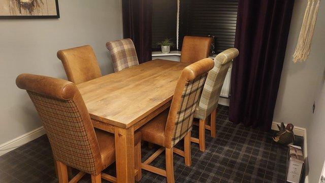 Preview of the first image of Dining table and six chairs excellent condition.