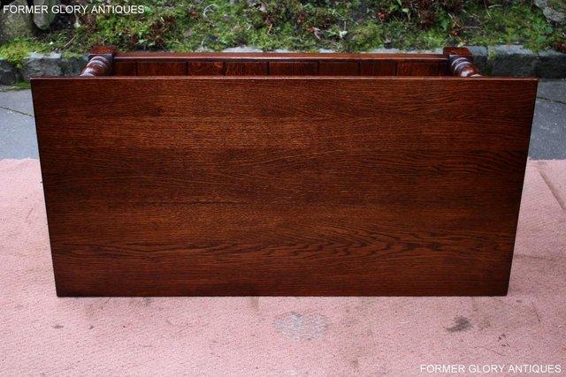 Image 35 of TAYLOR & Co STRESSED OAK THREE DRAWER POTBOARD COFFEE TABLE