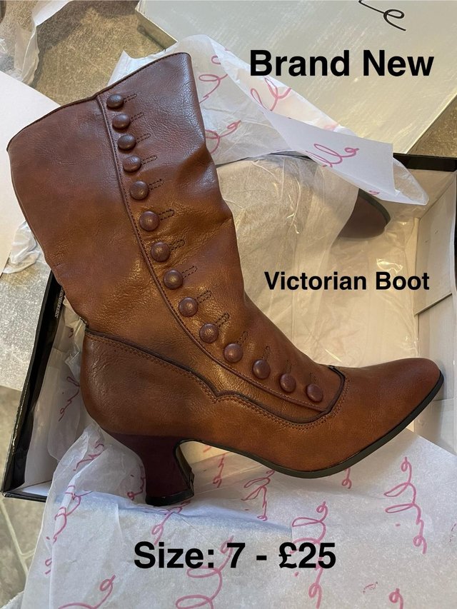 Preview of the first image of Victorian Style Antique Brown Kitten Heel Boots.