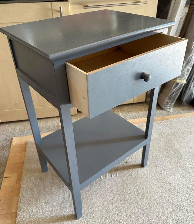 Preview of the first image of Small grey table with one drawer.