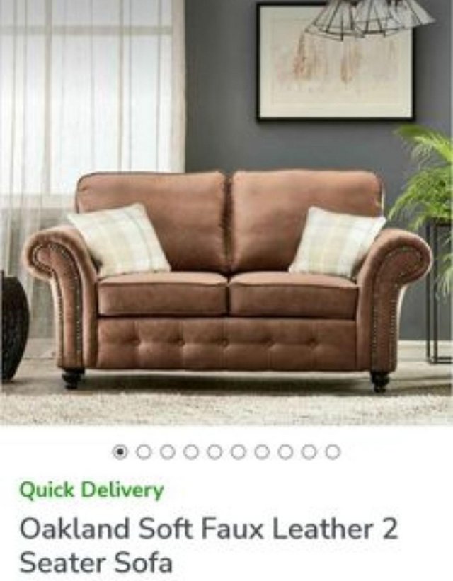 Preview of the first image of Dunelm Faux leather 2 seater settee in very good condition.