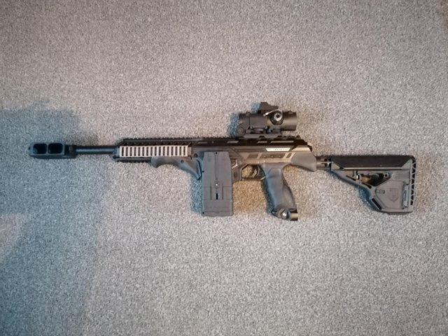 Preview of the first image of Tactical Black Dye Dam Paintball Marker For Sale.