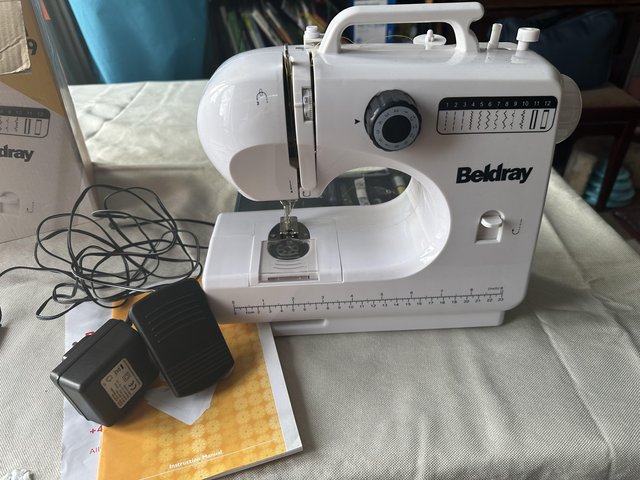 Preview of the first image of Beldray sewing machine with box and unopened kit.