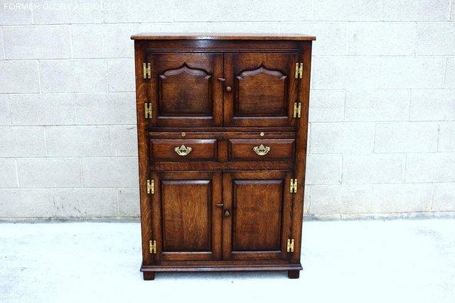 Image 1 of A TITCHMARSH AND GOODWIN DRINKS WINE CABINET CUPBOARD STAND