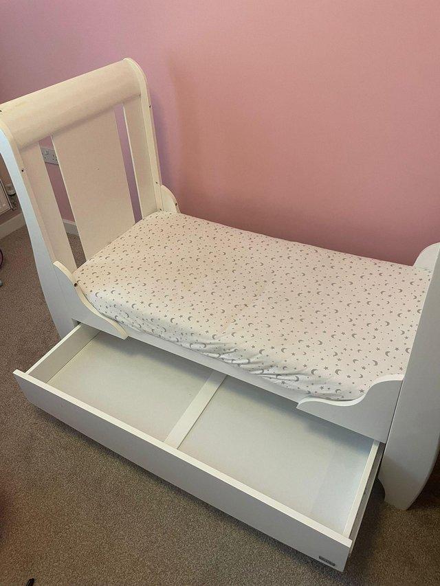 Preview of the first image of Tutti Bambini Katie mini sleigh cot bed.solid wood..