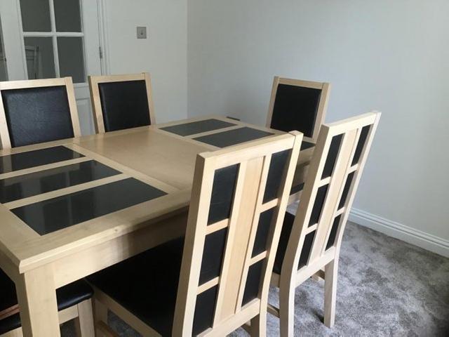 Preview of the first image of Dining table and  6 chairs oak or beech colour.