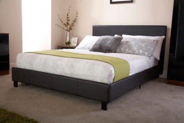 Image 1 of King white faux leather bed in a box bedstead