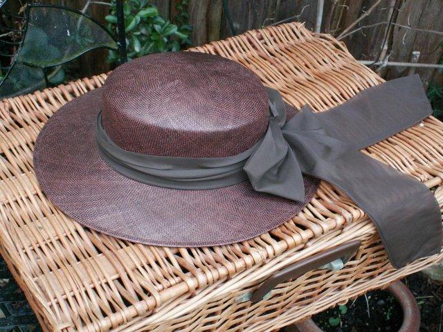 Preview of the first image of Hat for a special occasion. Brown..