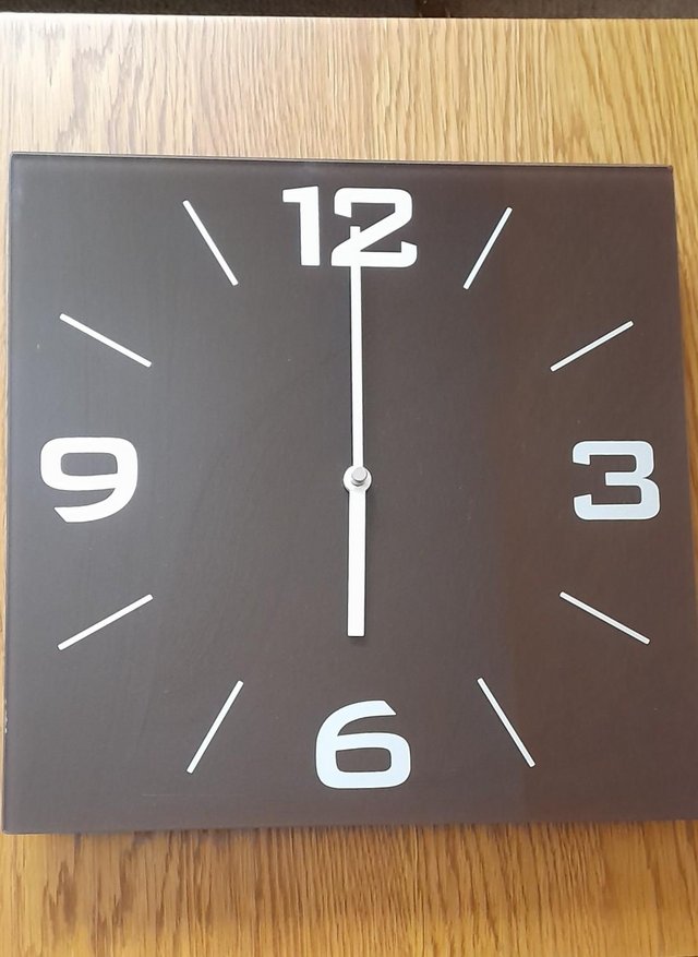 Preview of the first image of Shiny Square Wall Clock, brown in colour.