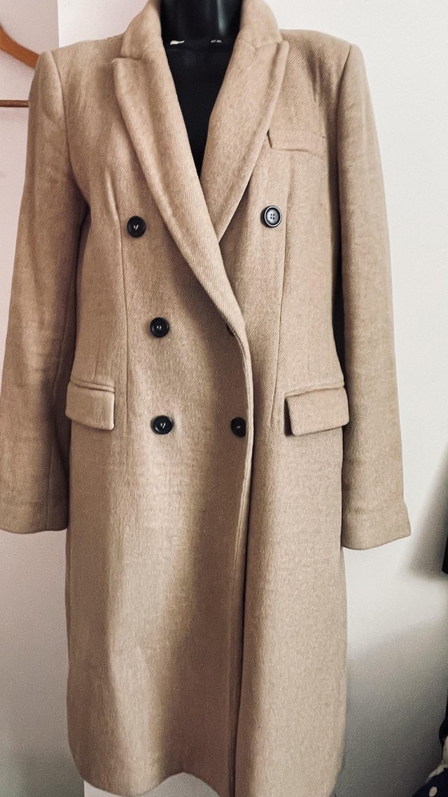 Preview of the first image of Women beige mini coat size 8 Zara.