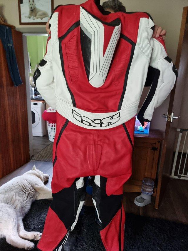 Preview of the first image of Motor bikeone pice lethers red/white.