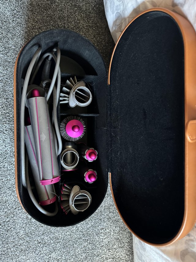 Preview of the first image of Dyson AirWrap™ Complete Multi-Styler Nickel/Fuchsia.