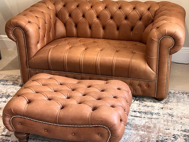 Preview of the first image of Leather 2 Seater Chesterfield with matching Foot Stool.