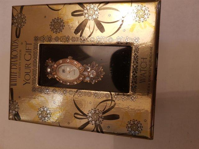 Preview of the first image of Elisabeth Taylor White Diamonds rhinestone encrusted watch.