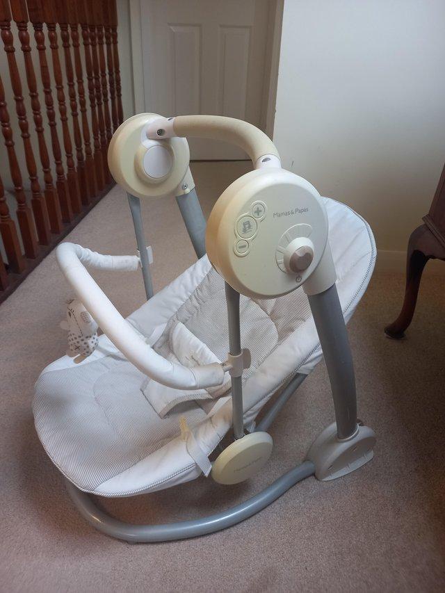 Preview of the first image of Mamas and Papas swing rocking baby seat.
