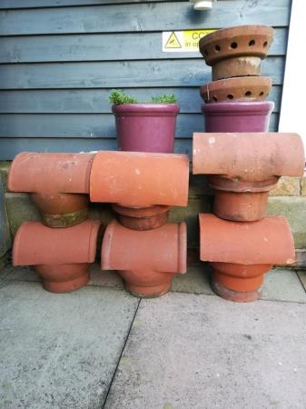 Image 3 of Assortment of chimney pots, cows etc poss del/fit?.