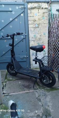 Image 2 of Sit and ride on E scooter