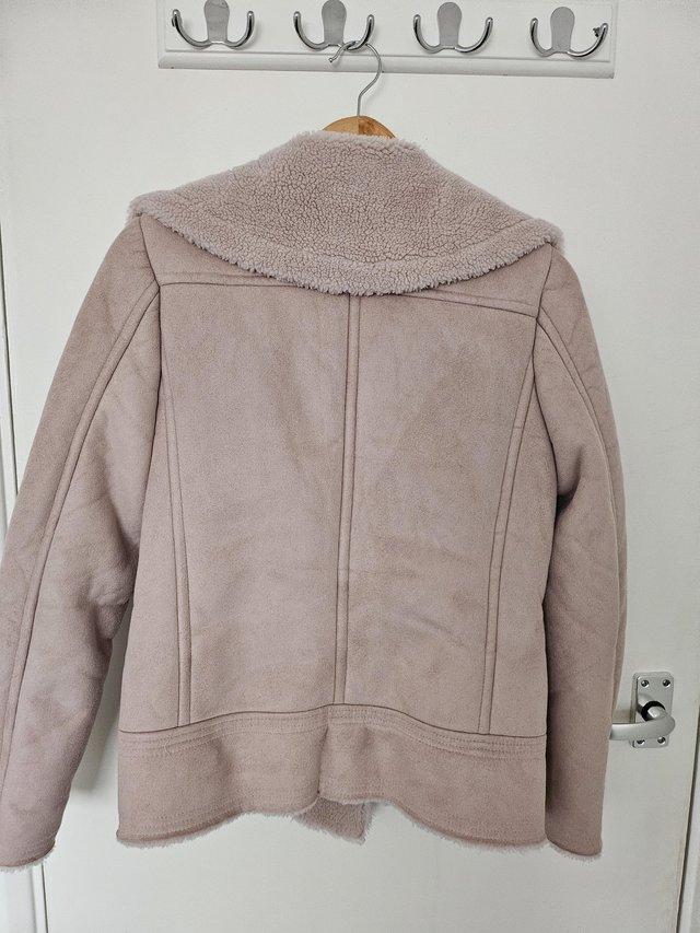 Preview of the first image of Next - Outerwear light pink size 10 coat.